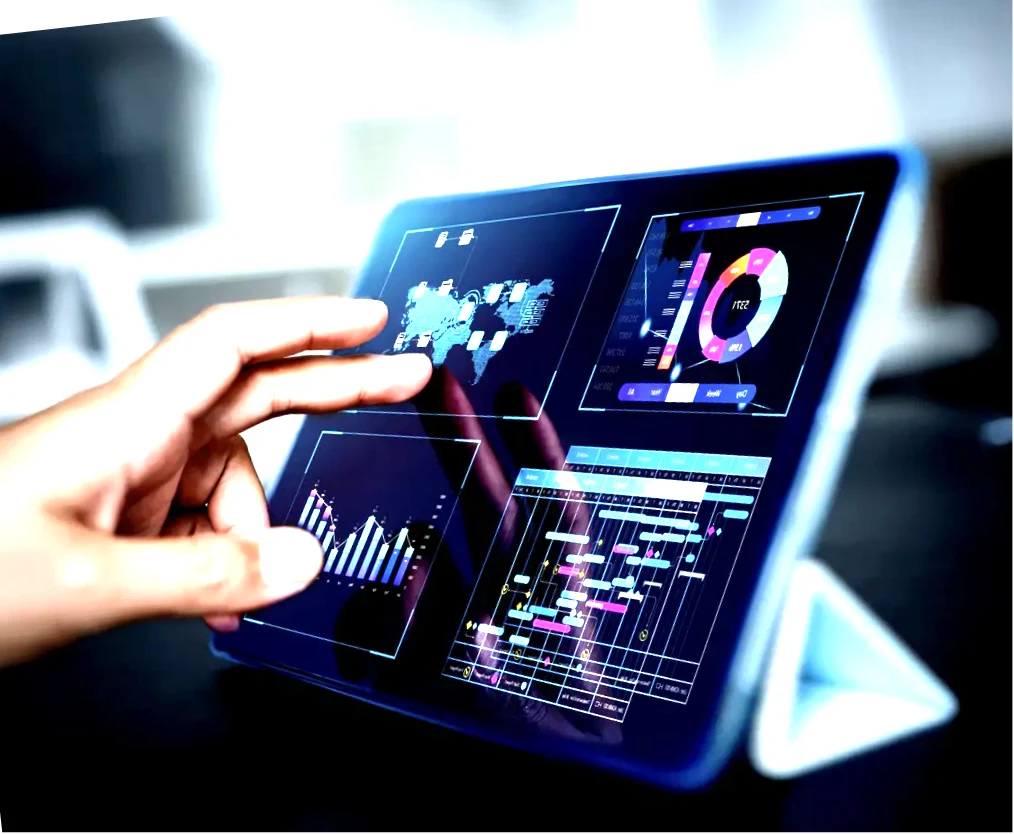A hand touching an analytics dashboard on a tablet